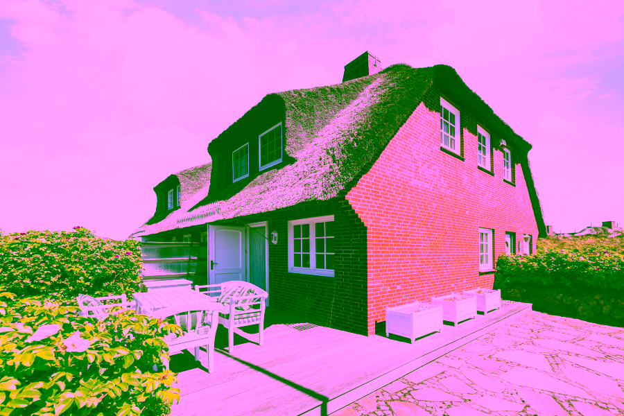 Bild - Reetgedecktes Hausteil zwischen beiden Meeren in Kampen