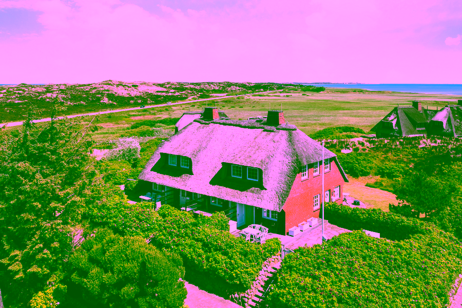 Titelbild - Reetgedecktes Hausteil zwischen beiden Meeren in Kampen