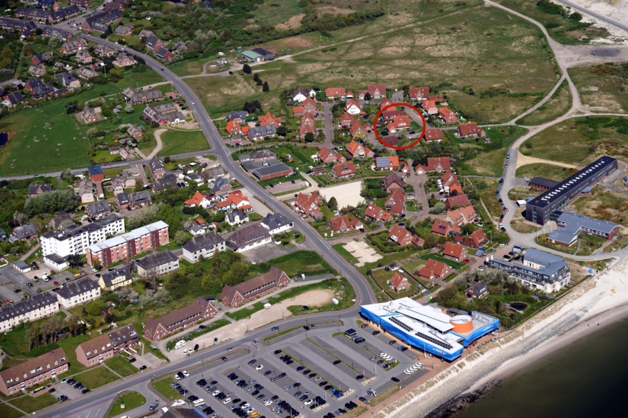 Bild - Gepflegtes Wohnhaus mit drei Appartements und einer Dauerwohnung in ruhiger Ortsrandlage von List