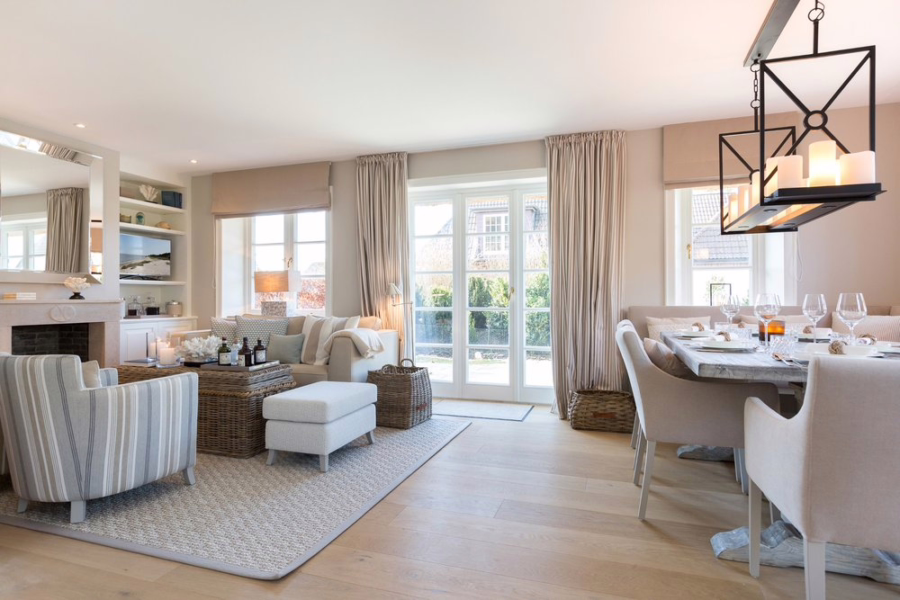 Bild - Doppelhaushälfte unter Reet am Dorfteich von Wenningstedt