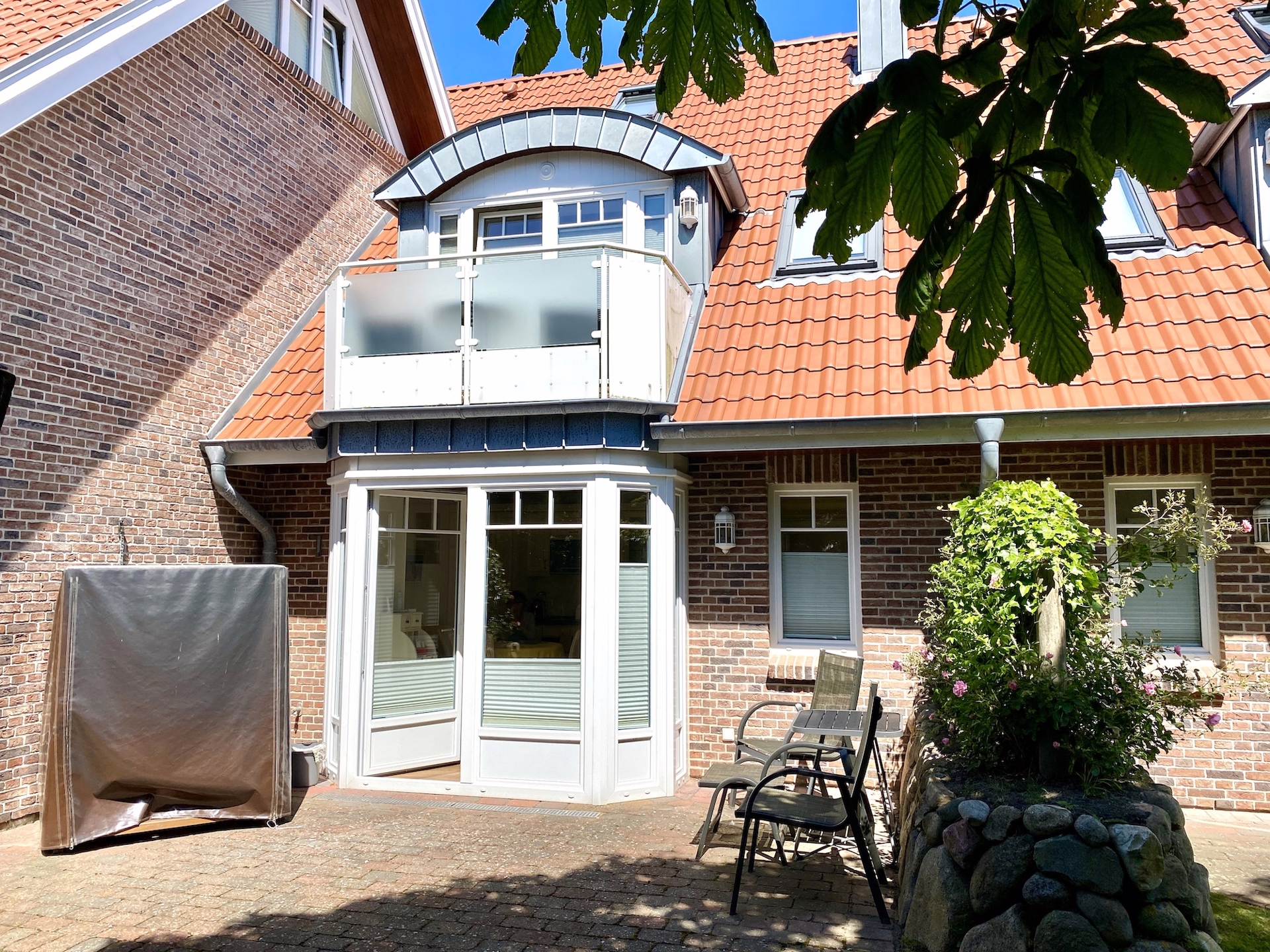 Bild - Erdgeschosswohnung mit Südterrasse und kleinem Gartengrundstück