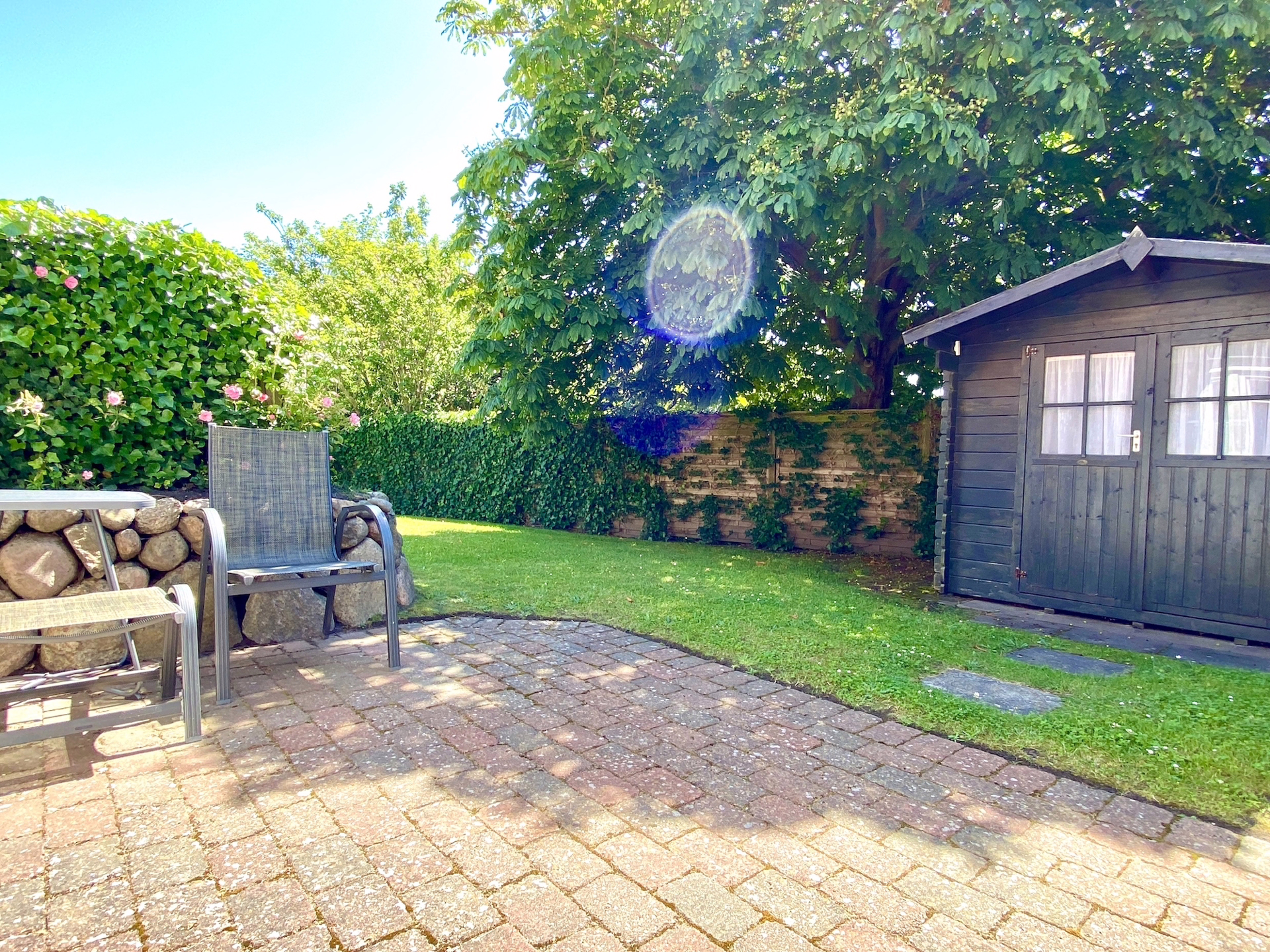 Bild - Erdgeschosswohnung mit Südterrasse und kleinem Gartengrundstück