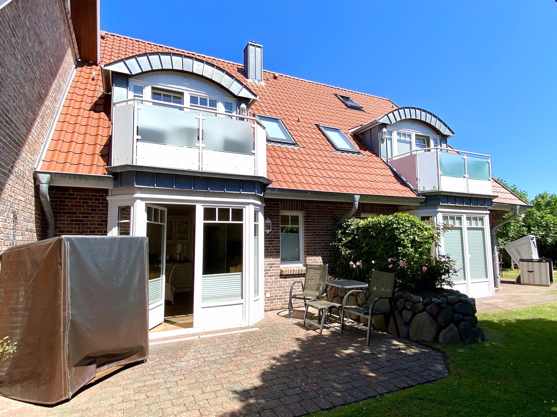 Bild - Erdgeschosswohnung mit Südterrasse und kleinem Gartengrundstück